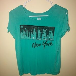 I am selling a justice shirt that has only been worn a few times.